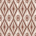 Earthgrain Harmony: Diamond Ikat Pattern in Brown and Beige with Vertical Motif Royalty Free Stock Photo